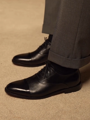 cap-toe Black Oxford shoes