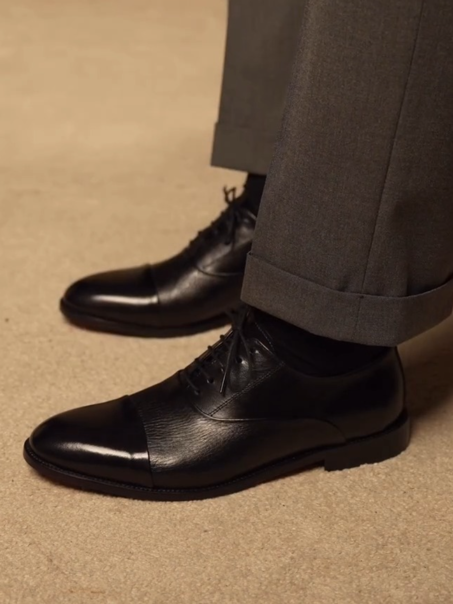cap-toe Black Oxford shoes
