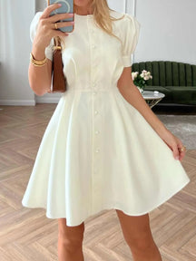 A-line mid-length dress with pearl buttons